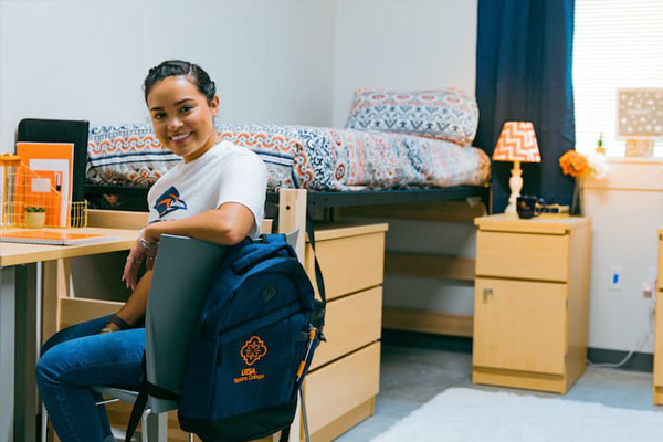 UTSA Honors Student in her dorm room